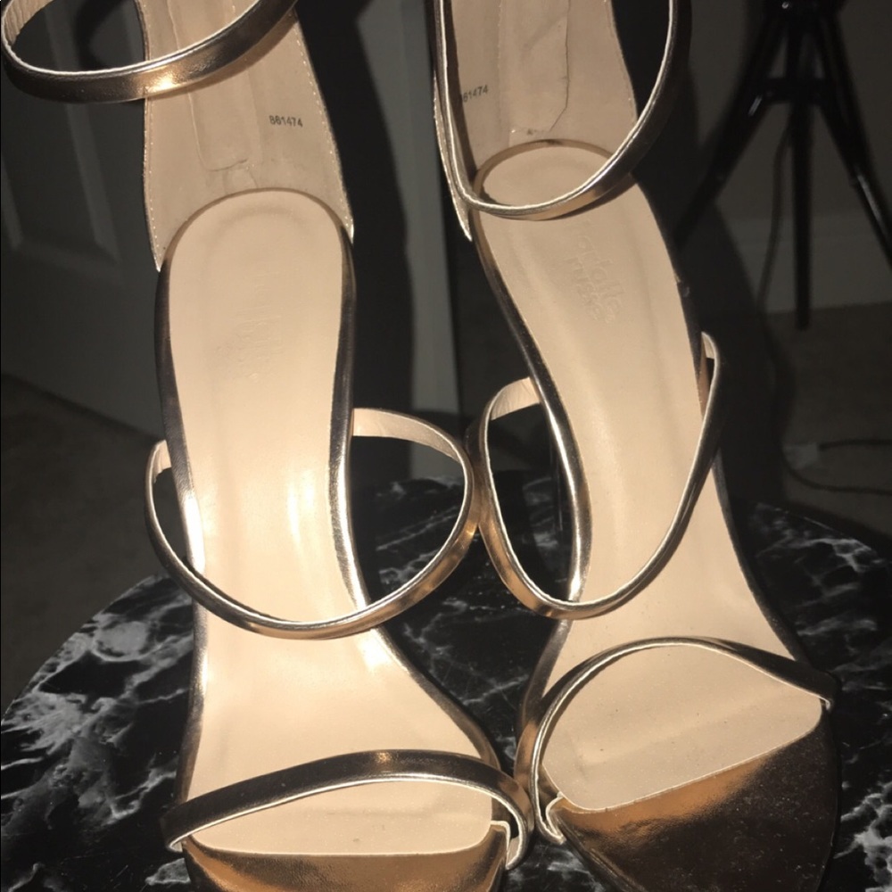 Gold high heels